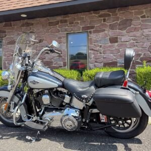 2012 Harley-Davidson Softail Heritage Classic FLSTC 103" 6 Speed, Exhaust, LED's and Only 9K Miles!    103"/1687cc Twin-Cam Engine. 6-Speed Transmission. Midnight Pearl and Brilliant Pearl Paint. Only 9,056 Miles!  Features/Upgrades: Python Slip-On Exhaust LED Headlight LED Passing Lamps Custom Dynamics LED Turn Signals Front and Rear Custom Dynamics LED Tail Light Chrome Engine Guards HD Skull Derby Cover, Timing Cover, Air Cleaner Cover, and Gas Cap HD Highway Pegs HD Hard Leather Cover Bags Security System with two hands-free fobs Anti-Lock Braking System (ABS) Chrome, Laced Steel wheels w/150 mm rear tire Chrome oil tank Chrome nostalgic “cats-eye” tank console with a retro speedometer face Detachable king-size Lexan® clear windshield Passenger backrest  VIN# 1HD1BWV11CB034555  WE FINANCE, TAKE TRADES & SHIP NATIONWIDE!  Payment $6500