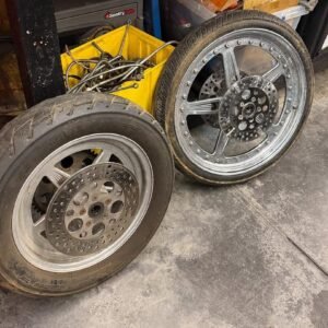 Matching Harley-Davidson Shovelhead mag wheels with chrome finish