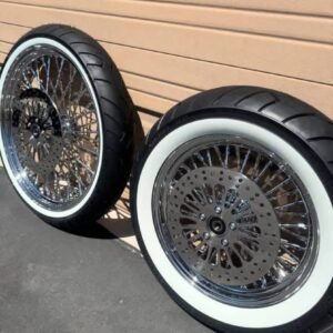 Harley-Davidson chrome rims with white wall tires